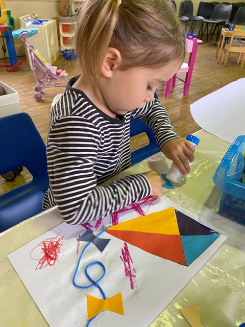 Child enjoying craft activities at Playaway